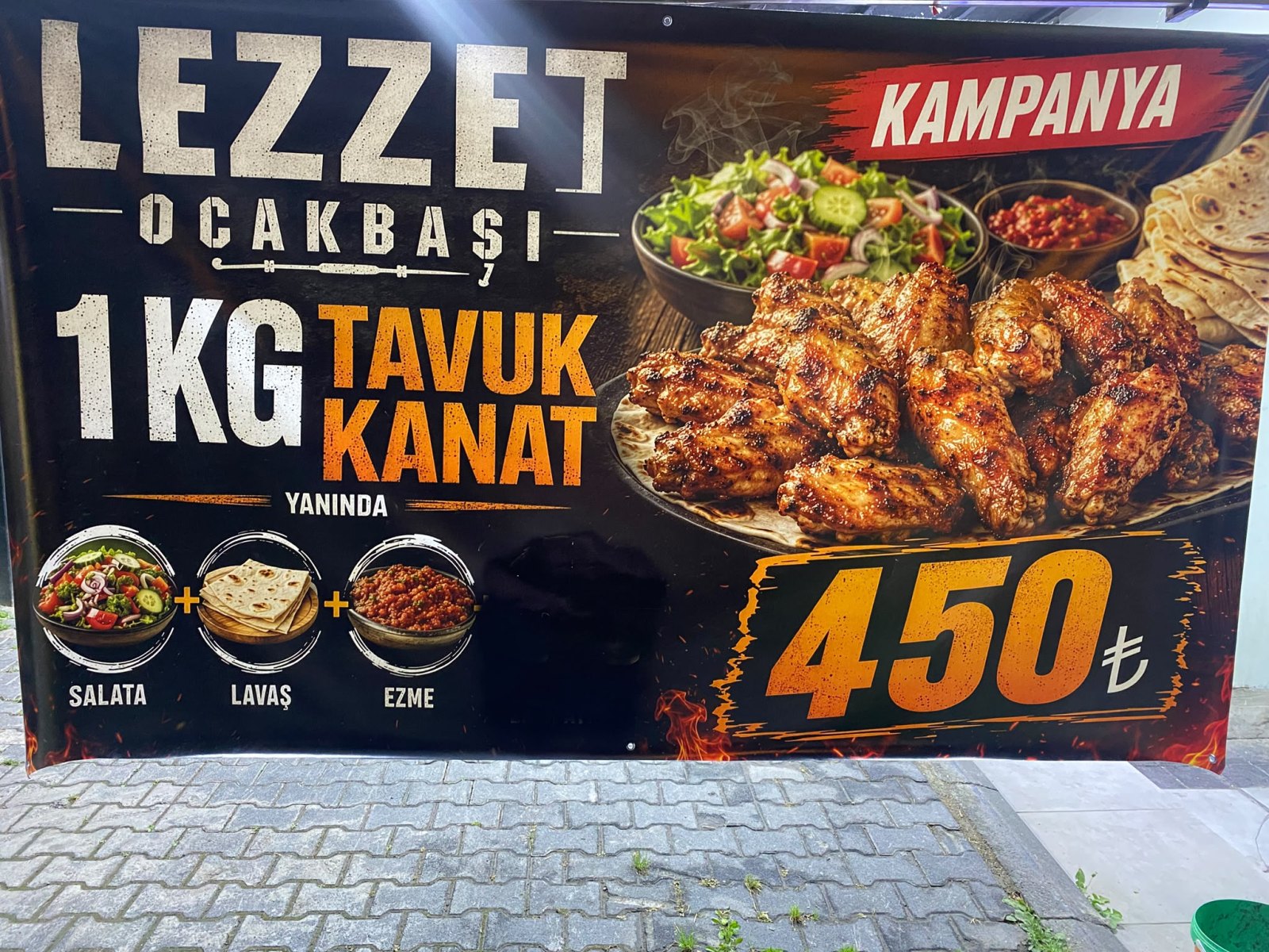 Lezzet Ocakbaşı kampanyası: 1 kg tavuk kanat, yanında salata, lavaş ve ezme — 450 TL